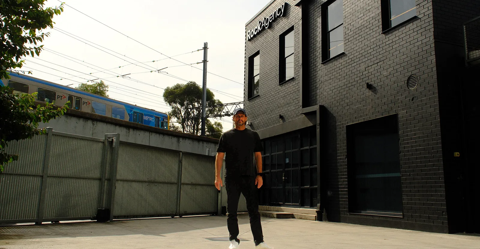 Managing Director Cam Lee standing out the front of Rock Agency